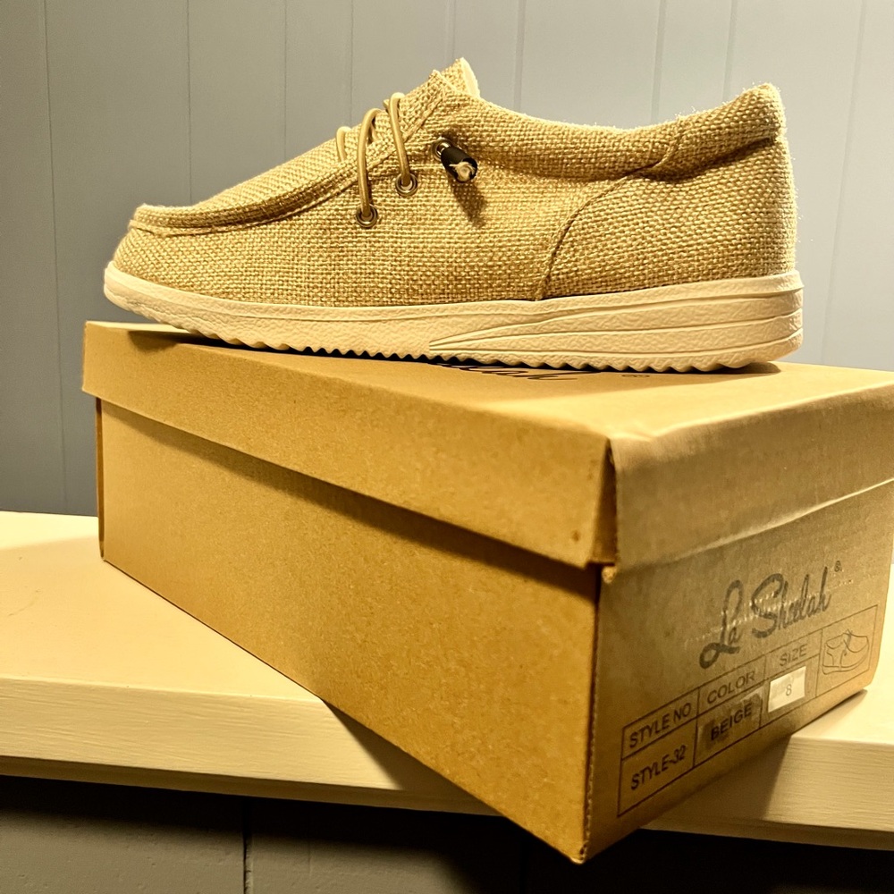 Slip-on beige shoes women's size 9 NEW
IN BOX